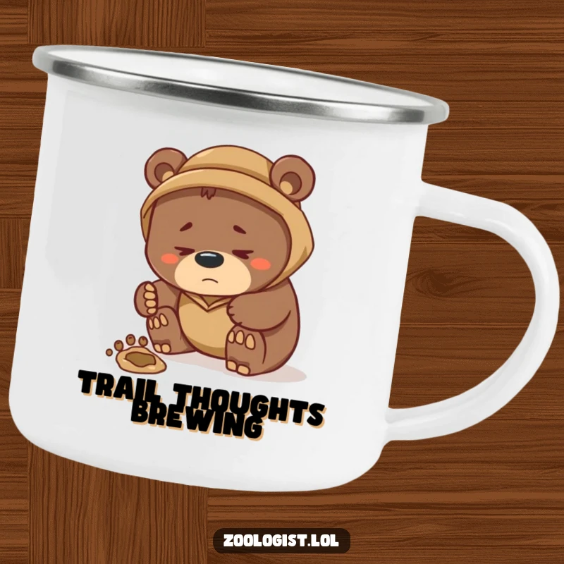 Funny camping mug with a focused bear zoologist inspecting a large footprint, perfect for enjoying beverages outdoors with a humorous wilderness theme.