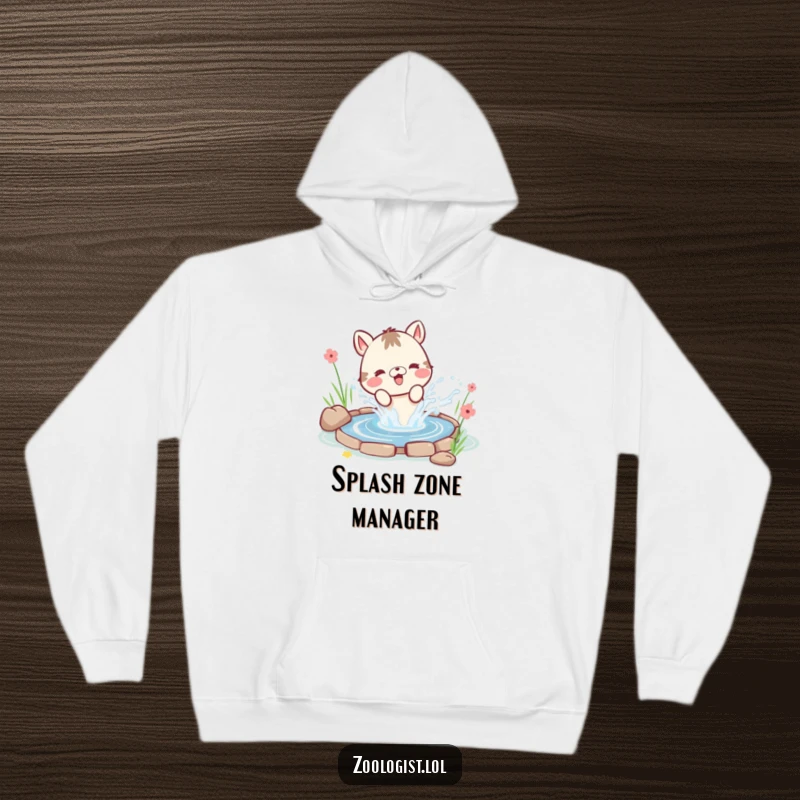 Funny cozy hoodie depicting a cute animal character happily splashing water from a small pond, with water droplets flying around.