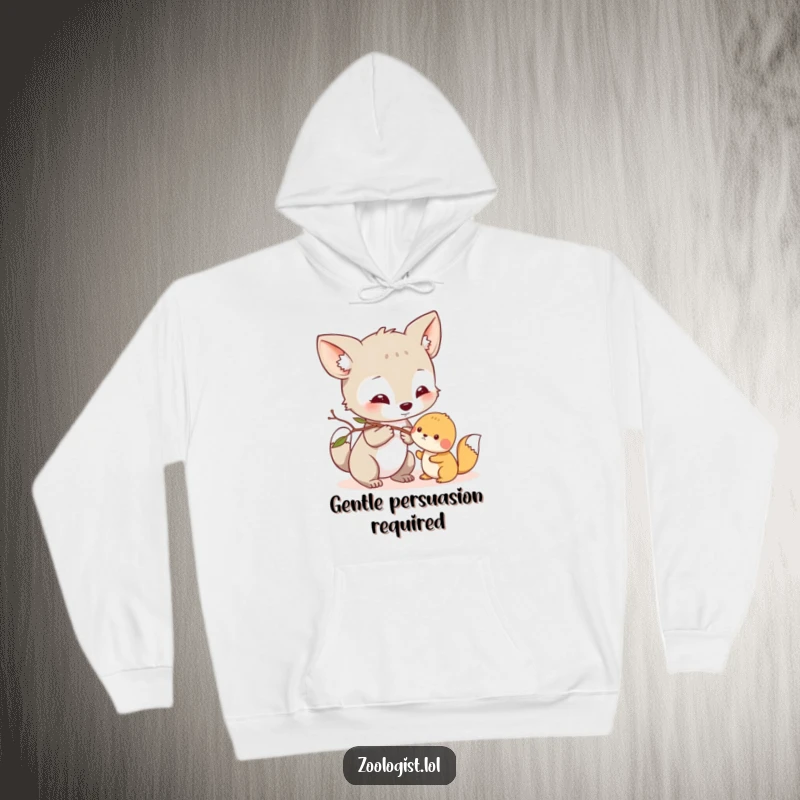 Funny Hoodie: Curious animal character gently nudges a small creature with a twig, showing a funny, tender interaction.