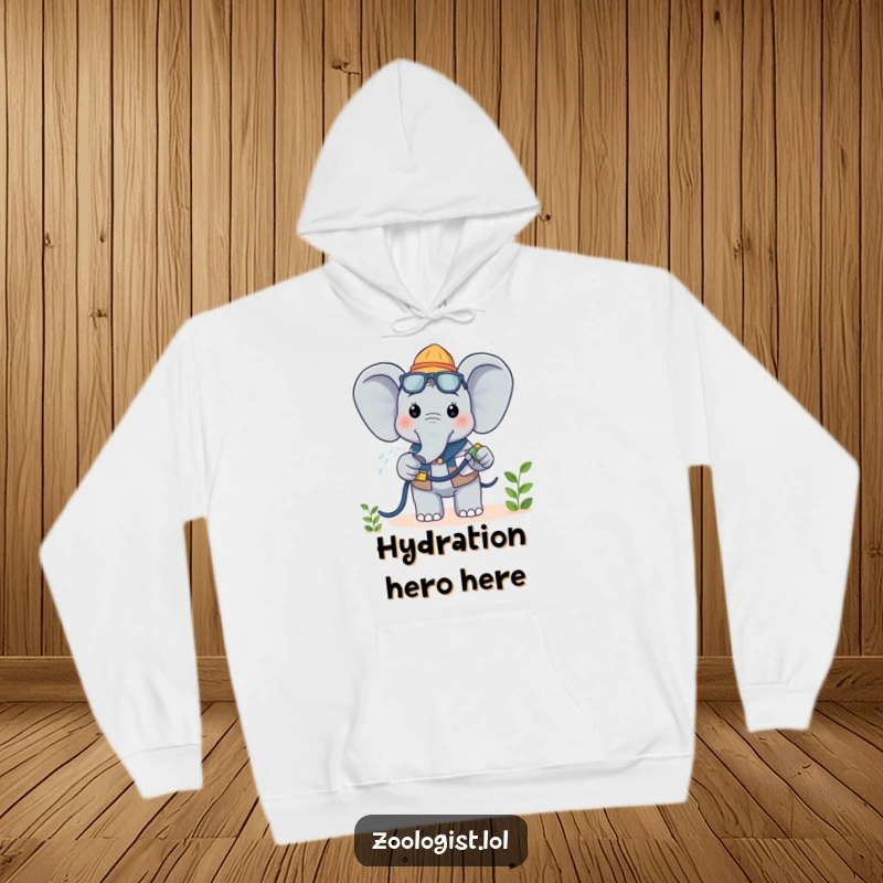 Funny Kawaii Elephant Zoologist Hoodie: A cheerful elephant zoologist happily waters a plant, offering warmth and botanical cheer.
