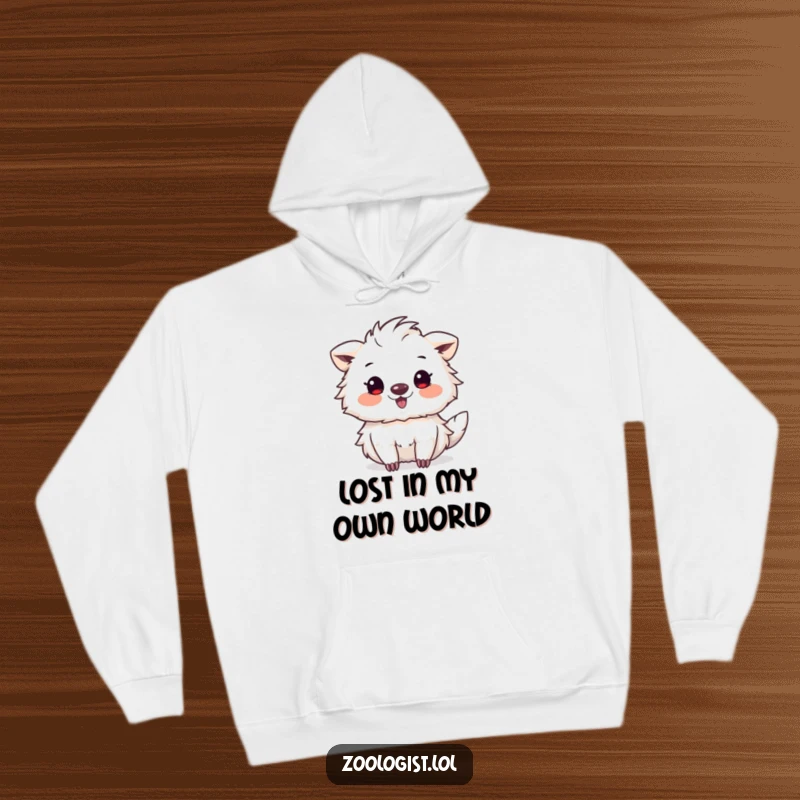 Funny hoodie with a cute animal artist excitedly sketching a bizarre yet beloved strange creature, radiating artistic delight and warmth.