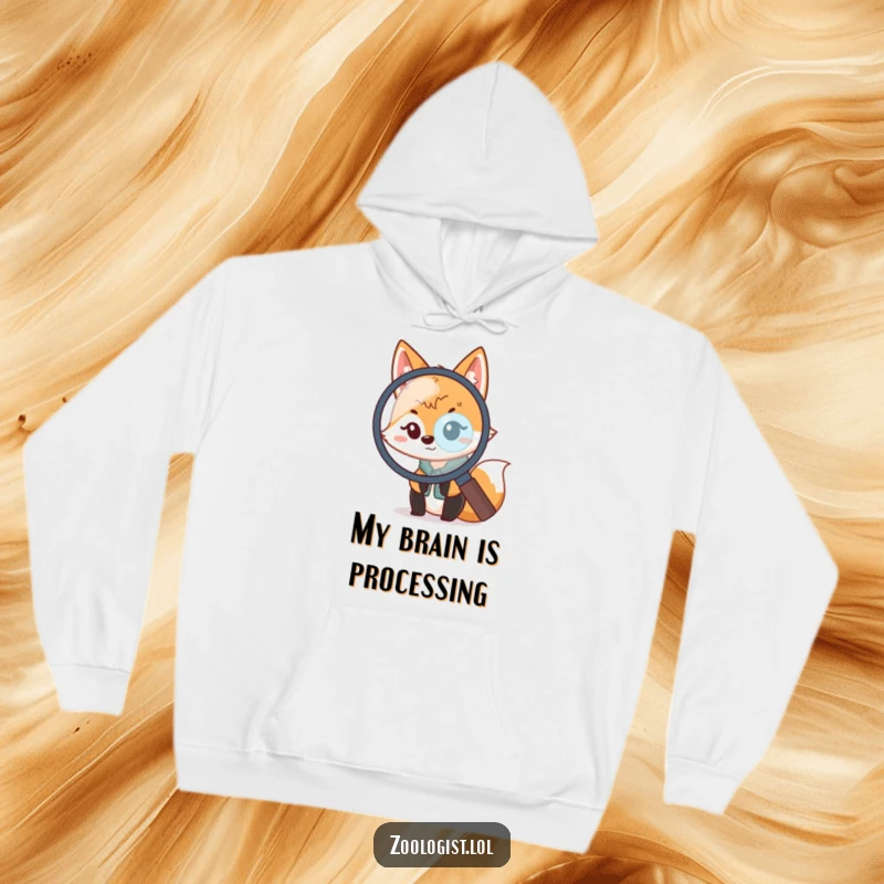 Funny Kawaii Fox Zoologist Hoodie: A cute fox scientist peeking out from a magnifying glass, offering a hilarious and cozy experience.