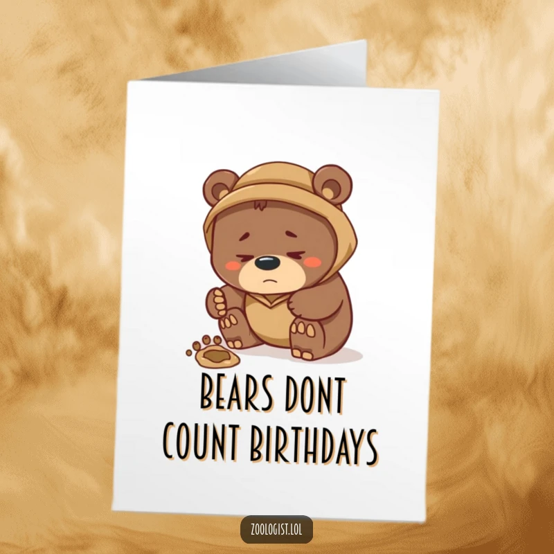 Funny Free Printable Birthday Card: A serious bear zoologist intently examines a large footprint with a comical furrowed brow.