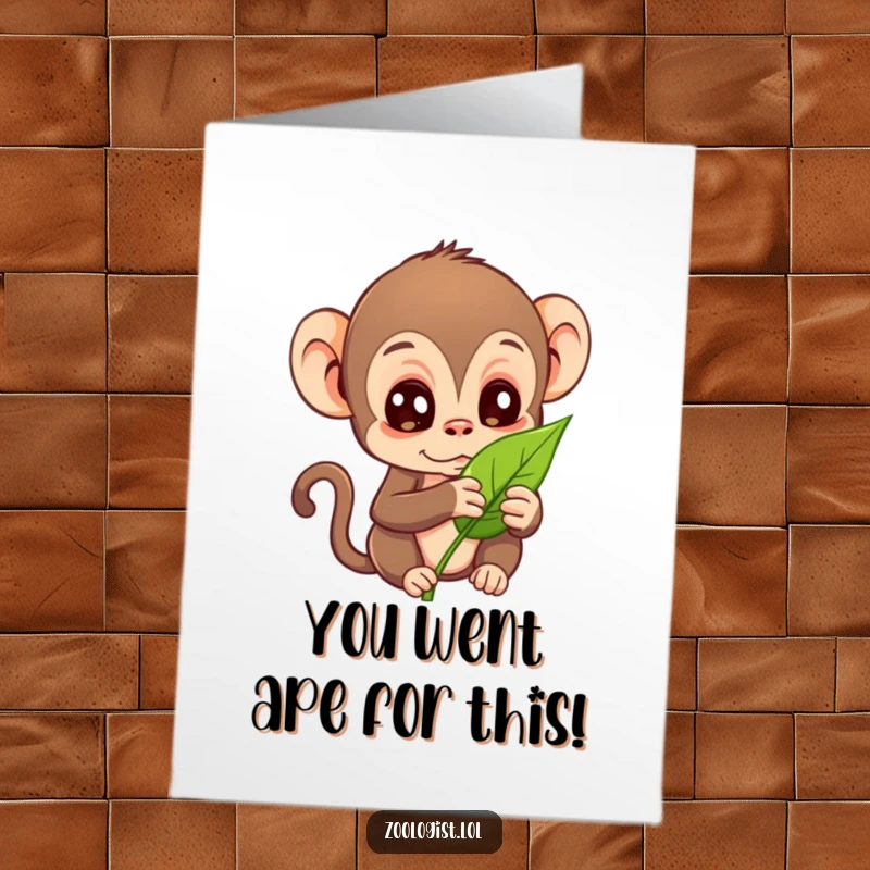 Funny Free Printable Congratulations Card: Monkey's wide eyes focused on a leaf, celebrating a fascinating find.