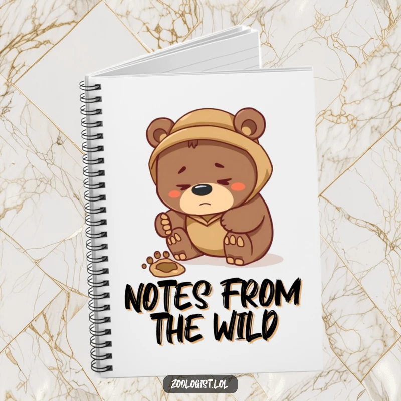 Funny notebook with a thoughtful bear zoologist examining a footprint, ideal for jotting down funny notes, observations, and creative ideas.