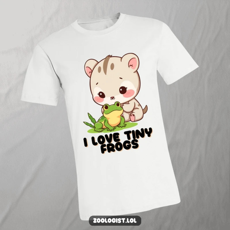 Funny T-Shirt: A cute animal character intently observing a minuscule frog with eyes wide with gentle excitement and curiosity.